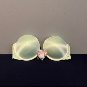 Pink Victoria’s Secret strapless bra. In good condition.